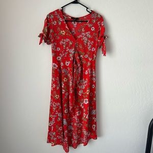 Size small red floral dress. In great pre owned condition!!
